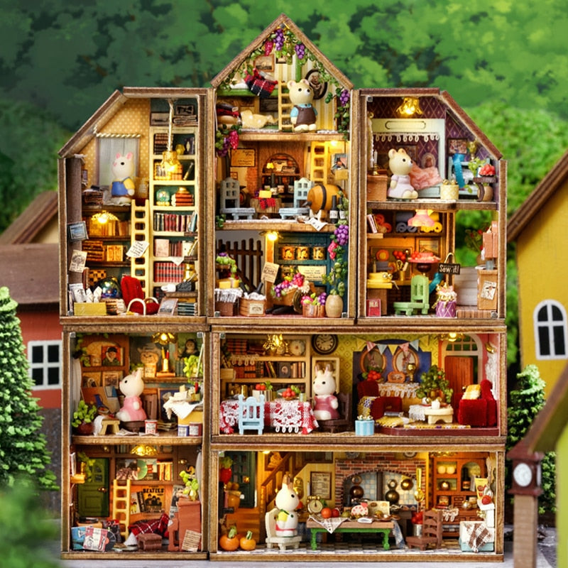 a doll house with a lot of furniture inside of it