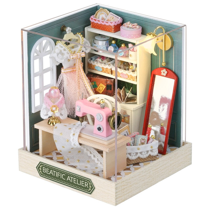 a doll house with furniture and accessories inside of it