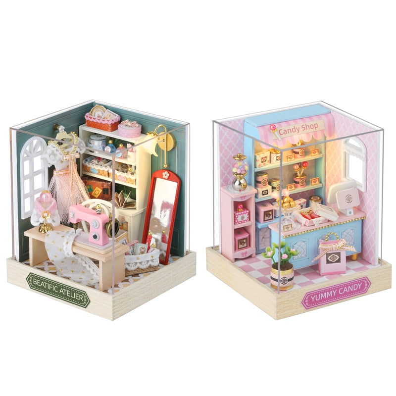 a doll house with two rooms and furniture